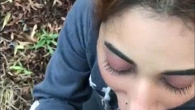 A Pakistani woman performs oral sex outdoors in Islamabad