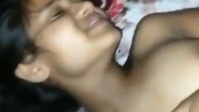 A young woman from Guwahati enjoys a passionate encounter with her lover, who skillfully explores her shaved and eager pussy, while she reciprocates with sweet moans of pleasure.