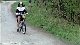 Nun on bike