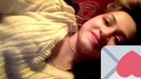 Indian woman displays large breasts and genitals during video call