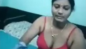 Several aunts engage in a sensual Tamil oral sex session with an older man