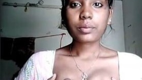 A sultry video featuring an Indian beauty revealing her ample bosom