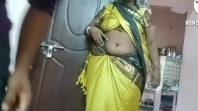 A Tamil wife indulges in erotic play with her navel, tastes honey, and engages in intimate relations