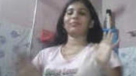 A seductive Indian beauty takes a bath