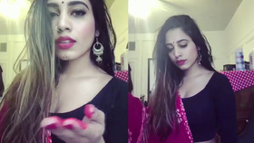 Stunning Indian beauty radiates passion during Holi celebration