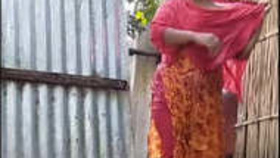 Hidden camera captures Indian village woman's private bathing session