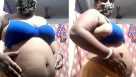 Aliya, the mature housewife, indulges in teasing and pleasure in a desi-inspired video