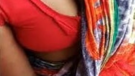 Village lady with large breasts and exposed cleavage