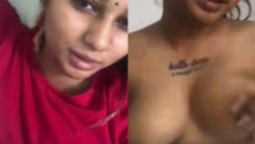 Indian woman proudly displays her large breasts