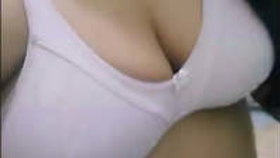 Mishal, a Pakistani girl, flaunts her ample bosom and curvy rear end in this video