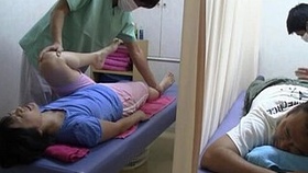 A Japanese wife receives an anal massage with a young man