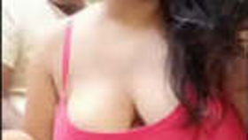 Desi boudi's large breasts are the focus of this sensual video