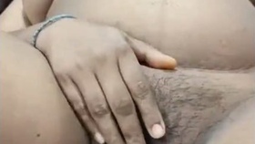 A South Indian wife reveals her moist vagina after being coated in semen