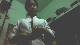 Indian girl captures herself in her room after switching outfits