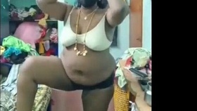 Experience a seductive live session with a tantalizing Tamil beauty