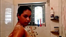Amateur Desi woman carefully washes naked body in the bathroom