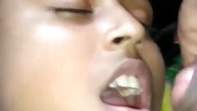 Pretty girl taking cum on her face.