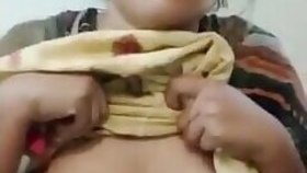 Sexy Pakistani wife shows off her tits and gives a blow job