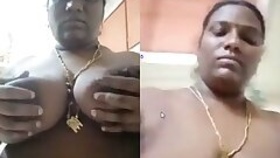 South Indian bhabhi with hot tits rubs her pussy with fringe video