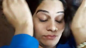 Desi's wife lets out sweet moans as she fucks.